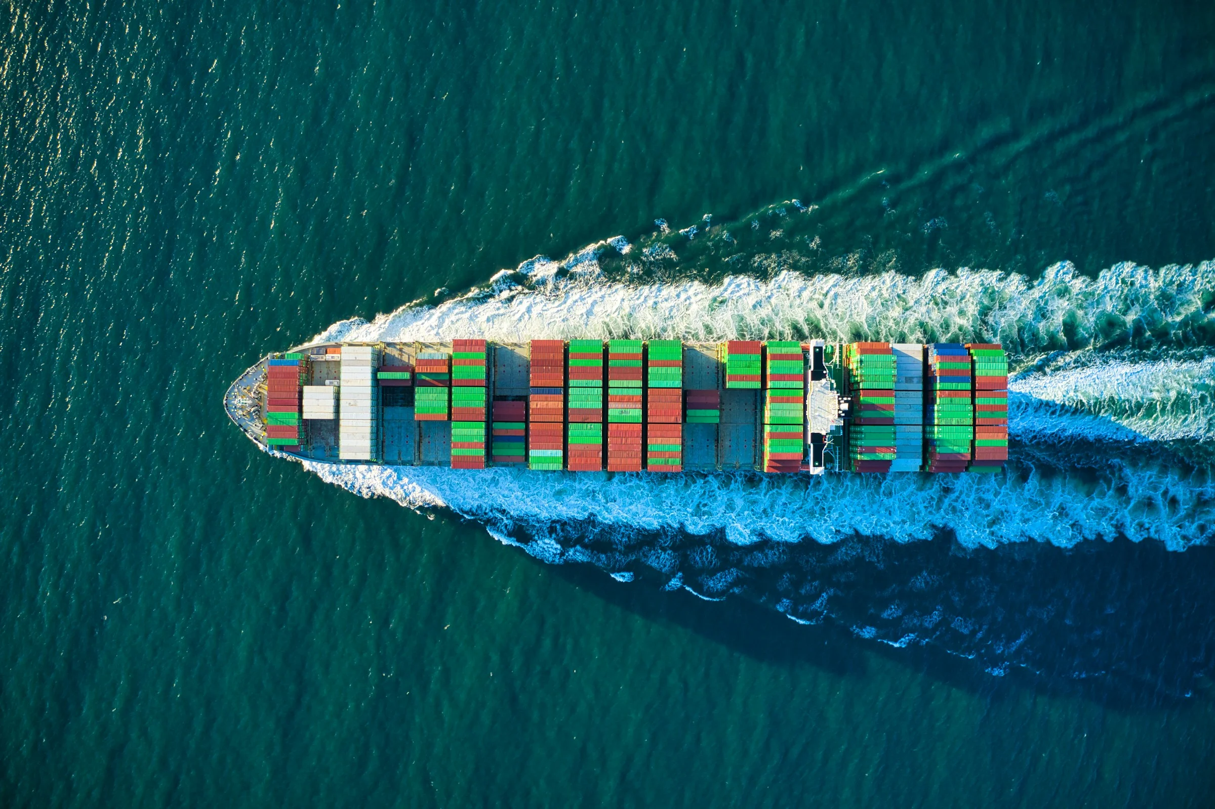 A container ship under way, seen from above